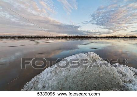 Sunset over the Porcupine River; Old Crow, Yukon, Canada View Large Photo Image Stock Photograph - Sunset over the Porcupine River; Old Crow, Yukon, Canada. Fotosearch