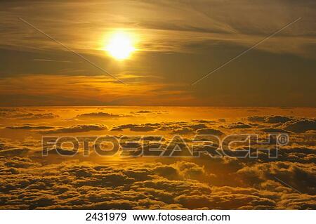 Sunset viewed above the clouds at Haleakala National Park; Maui, Hawaii, United States of America View Large Photo Image Stock Photo - Sunset viewed above the clouds at Haleakala National Park; Maui, Hawaii, United States of America. Fotosearch