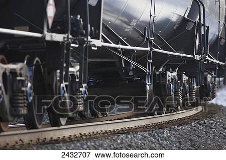 Stock Photo - Tank cars on moving freight train; Milton, Ontario, Canada. Fotosearch