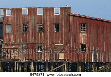 The big red net shed is a prominent riverfront landmark; Astoria, Oregon, United States of America View Large Photo Image Stock Image - The big red net shed is a prominent riverfront landmark; Astoria, Oregon, United States of America. Fotosearch