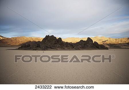 Stock Image - The sun sets over Death Valley; California, United States of America. Fotosearch