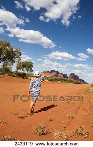 Woman in the outback, The Olgas; Northern Australia, Australia View Large Photo Image Stock Photo - Woman in the outback, The Olgas; Northern Australia, Australia. Fotosearch