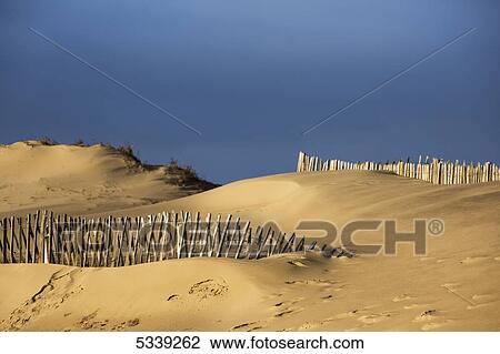 Wooden post fence along a beach with blue sky; South Shields, Tyne and Wear, England View Large Photo Image Stock Image - Wooden post fence along a beach with blue sky; South Shields, Tyne and Wear, England. Fotosearch