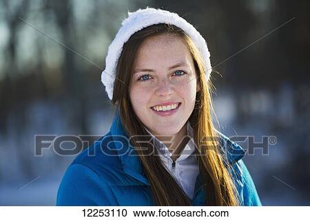 Stock Image - 18-year-old-girl in winter jacket; Ledyard, Connecticut, USA. Fotosearch