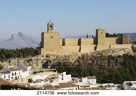Stock Photograph - 18Th Century Alcazaba De Antequera With 'the Lover's Leap; In The Background; Antequera Malaga Andalusia Spain. Fotosearch