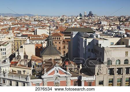 Picture - 18Th Century Church Of San Jose In Foreground And View Of 20Th Century Business Centre In Background; Madrid Spain. Fotosearch