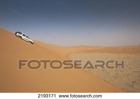 4 Wheel Drive Going Down Steep Sand Duneliwa, Abu Dhabi, Uae View Large Photo Image Stock Image - 4 Wheel Drive Going Down Steep Sand Duneliwa, Abu Dhabi, Uae. Fotosearch