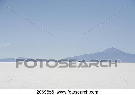 Stock Photograph - 4X4 Vehicle In The Salar De Uyuni, The World's Largest Salt Flat, Potosi Department, Bolivia. Fotosearch