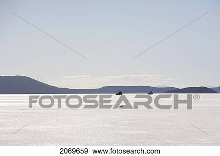 Stock Photo - 4X4 Vehicles In The Salar De Uyuni, The World's Largest Salt Flat, Potosi Department, Bolivia. Fotosearch
