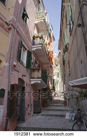 Stock Image - A Back Alley Between Houses; Monterosso Al Mare, Liguria, Italy. Fotosearch