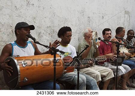 A band playing outside a bar at the monthly antiques fair on Rua do Lavradio, Lapa; Rio de Janeiro, Brazil View Large Photo Image Stock Photograph - A band playing outside a bar at the monthly antiques fair on Rua do Lavradio, Lapa; Rio de Janeiro, Brazil. Fotosearch