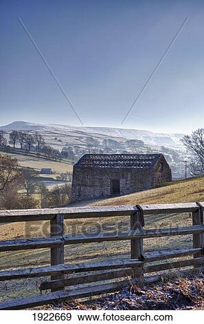 A Barn On A Hilly Landscape In The Fog; Yorkshire Dales, England View Large Photo Image Stock Photo - A Barn On A Hilly Landscape In The Fog; Yorkshire Dales, England. Fotosearch