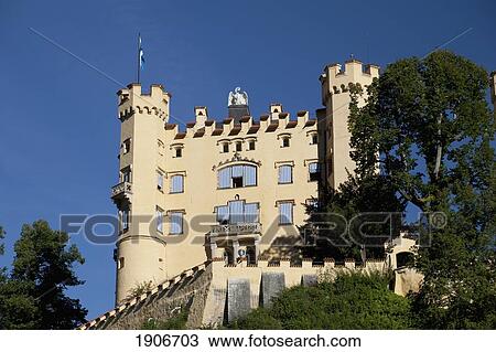 A Bavarian Castle On A Hillside With A Blue Sky; Fussen, Germany View Large Photo Image Stock Image - A Bavarian Castle On A Hillside With A Blue Sky; Fussen, Germany. Fotosearch