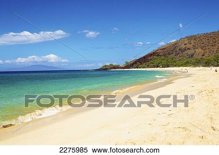 Stock Photography - A beach along the coastline of an hawaiian island; Hawaii, United States of America. Fotosearch