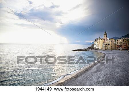 A Beach And Buildings Along The Coast; Italy View Large Photo Image Stock Photo - A Beach And Buildings Along The Coast; Italy. Fotosearch