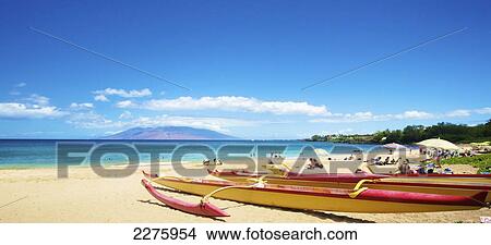 A beach with sunbathers and a boat; Hawaii, United States of America View Large Photo Image Picture - A beach with sunbathers and a boat; Hawaii, United States of America. Fotosearch