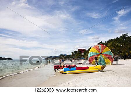 Stock Image - A beautiful day at Cenang beach; Langkawi, Malaysia. Fotosearch