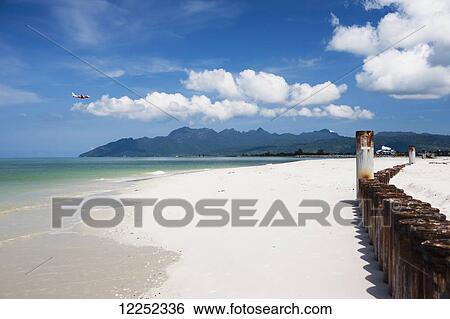 A beautiful day at Cenang beach; Langkawi, Malaysia View Large Photo Image Stock Photograph - A beautiful day at Cenang beach; Langkawi, Malaysia. Fotosearch
