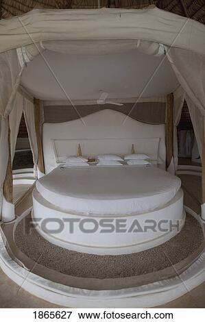 Stock Photo - A Bed In Shompole Lodge, Kenya, Africa. Fotosearch
