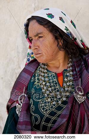 A Berber Woman In The Largely Abandoned Hilltop Village Of Chenini In The Province Of Tataouine; Tunisia, North Africa View Large Photo Image Stock Image - A Berber Woman In The Largely Abandoned Hilltop Village Of Chenini In The Province Of Tataouine; Tunisia, North Africa. Fotosearch