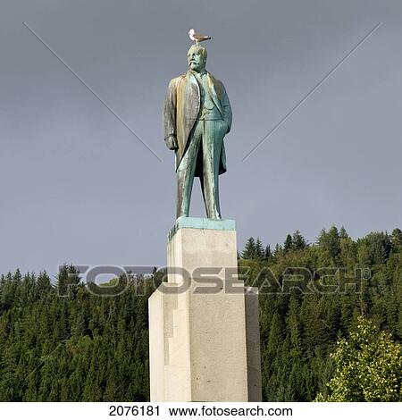 A Bird Stands On The Head Of The Statue Of A Male Figure; Bergen Norway View Large Photo Image Stock Image - A Bird Stands On The Head Of The Statue Of A Male Figure; Bergen Norway. Fotosearch