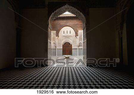 A black and white tiled floor leading to a courtyard through an arched doorway; Morocco View Large Photo Image Stock Photograph - A black and white tiled floor leading to a courtyard through an arched doorway; Morocco. Fotosearch