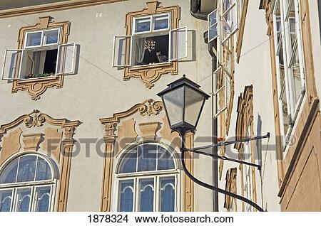 A Black Cat Looks Out Of An Open Window In Traditional Building View Large Photo Image Picture - A Black Cat Looks Out Of An Open Window In Traditional Building. Fotosearch