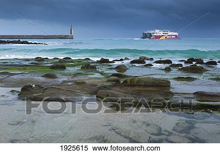 Stock Photography - A Boat In The Harbor; Tarifa, Cadiz, Andalusia, Spain. Fotosearch