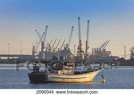 Picture - A Boat In The Water At Neuvo Puerto; Palos De La Frontera, Huelva Province, Andalusia, Spain. Fotosearch