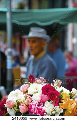 A bouquet of colourful roses on display at a market; Cite, France View Large Photo Image Stock Photography - A bouquet of colourful roses on display at a market; Cite, France. Fotosearch