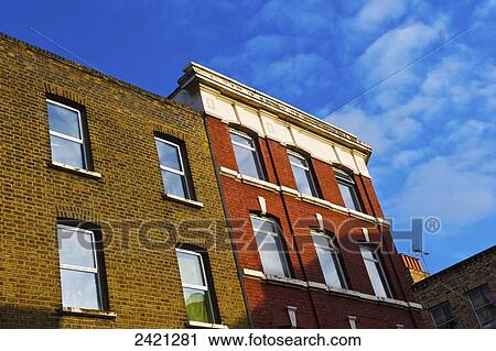 A brick residential building, Brick Lane; London, England View Large Photo Image Stock Image - A brick residential building, Brick Lane; London, England. Fotosearch