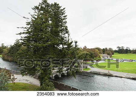 A Bridge And Parking Lot By A River; Cong, County Mayo, Ireland View Large Photo Image Stock Image - A Bridge And Parking Lot By A River; Cong, County Mayo, Ireland. Fotosearch