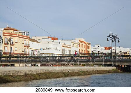 A Bridge Crossing A River; Chiclana De La Frontera, Andalucia, Spain View Large Photo Image Stock Photo - A Bridge Crossing A River; Chiclana De La Frontera, Andalucia, Spain. Fotosearch