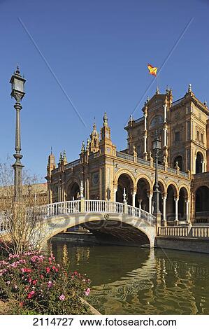 Stock Photo - A Bridge Over A Waterway At The Plaza De Espana; Seville Andalusia Spain. Fotosearch