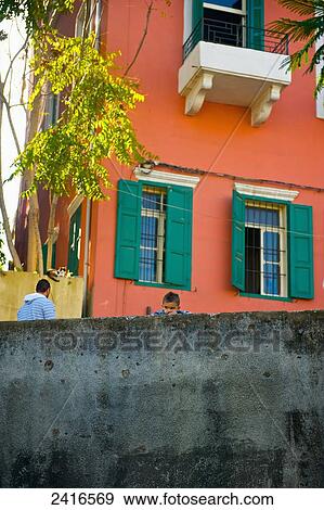 A brightly coloured building with green shutters on the windows; Beirut, Lebanon View Large Photo Image Stock Photo - A brightly coloured building with green shutters on the windows; Beirut, Lebanon. Fotosearch
