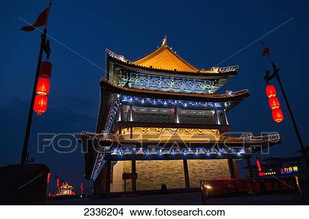 A Building Illuminated At Night Along The Lianhu Ancient City Wall; Xi'an, Shaanxi, China View Large Photo Image Picture - A Building Illuminated At Night Along The Lianhu Ancient City Wall; Xi'an, Shaanxi, China. Fotosearch