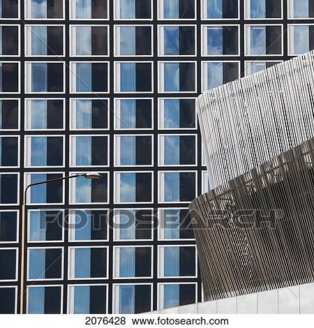Stock Photo - A Building Of Windows With A Unique Silver Metal Structure; Stockholm Sweden. Fotosearch