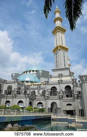 A Building With A Blue Dome And A Tall Tower On The Roof With Water Around It; Kuala Lumpur, Malaysia View Large Photo Image Stock Photo - A Building With A Blue Dome And A Tall Tower On The Roof With Water Around It; Kuala Lumpur, Malaysia. Fotosearch