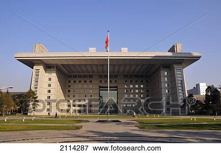 Stock Photo - A Building With A Flag Pole In Front; Beijing China. Fotosearch