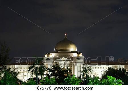 Stock Photograph - A Building With A Gold Dome Roof; Kuala Lumpur, Malaysia. Fotosearch