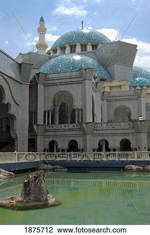 A Building With Blue Domes And Towers On The Roof And Is Surrounded By Water; Kuala Lumpur, Malaysia View Large Photo Image Stock Image - A Building With Blue Domes And Towers On The Roof And Is Surrounded By Water; Kuala Lumpur, Malaysia. Fotosearch