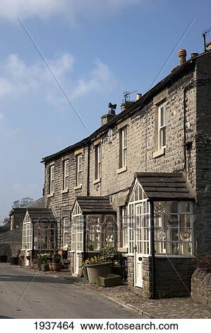 Picture - A Building With Three Entrances; Middleham Yorkshire England. Fotosearch