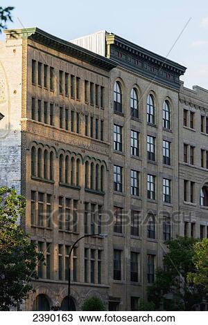 A building with unique windows and facade; Winnipeg, Manitoba, Canada View Large Photo Image Stock Image - A building with unique windows and facade; Winnipeg, Manitoba, Canada. Fotosearch