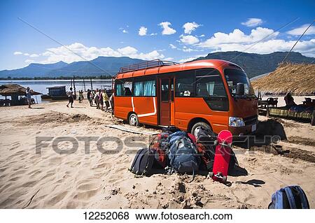 A bus getting stuck in the sand; Laos View Large Photo Image Stock Photo - A bus getting stuck in the sand; Laos. Fotosearch