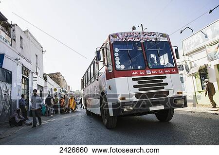 A bus in the street around the old city of Harar in Eastern Ethiopia; Harar, Ethiopia View Large Photo Image Stock Image - A bus in the street around the old city of Harar in Eastern Ethiopia; Harar, Ethiopia. Fotosearch