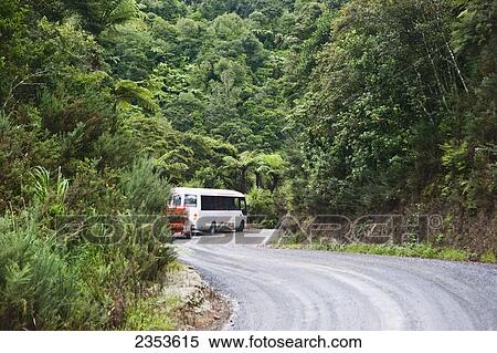Stock Photography - A Bus Travelling On A Road To The Bay Of Islands; New Zealand. Fotosearch