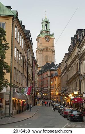 Stock Photo - A Busy Street And Clock Tower On A Building; Stockholm Sweden. Fotosearch