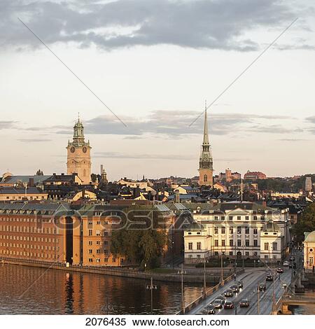 Stock Photography - A Busy Street Going Over The River; Stockholm Sweden. Fotosearch