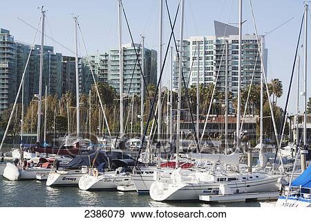 Stock Photo - A busy waterfront with boats in the harbour; California, United States of America. Fotosearch