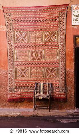 A carpet hanging on a wall in the Mellah; Marrakesh, Morocco View Large Photo Image Stock Photograph - A carpet hanging on a wall in the Mellah; Marrakesh, Morocco. Fotosearch